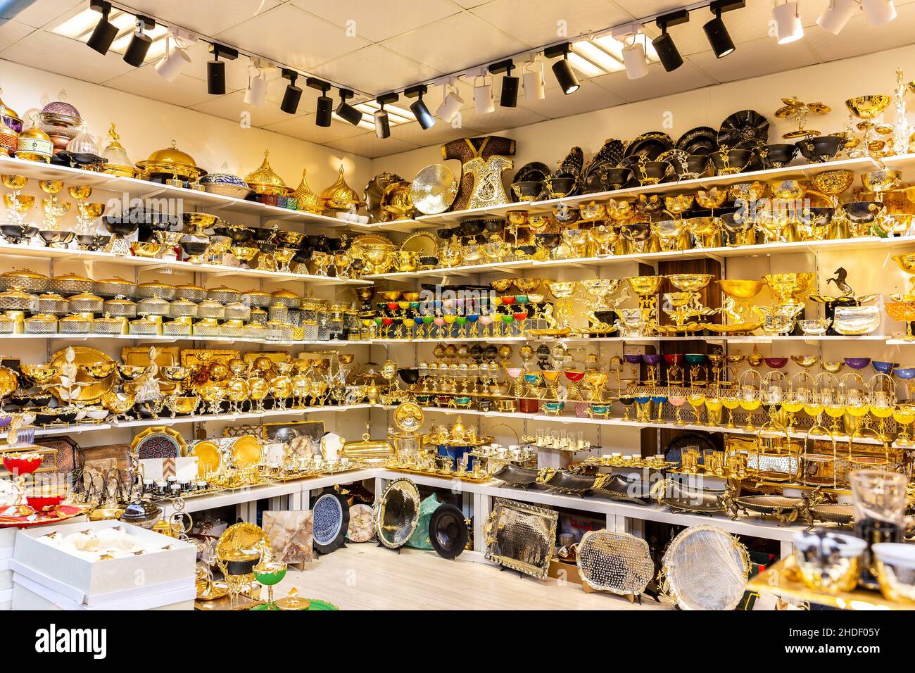 Turkish traditional shop (souk) with golden decorative tableware