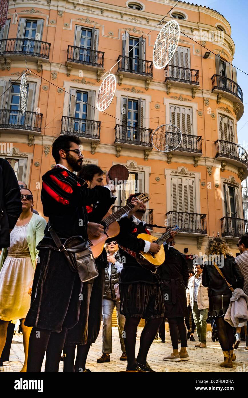 Tunas, traditional street music. Street scene, Malaga city, Andalusia, Spain Stock Photo