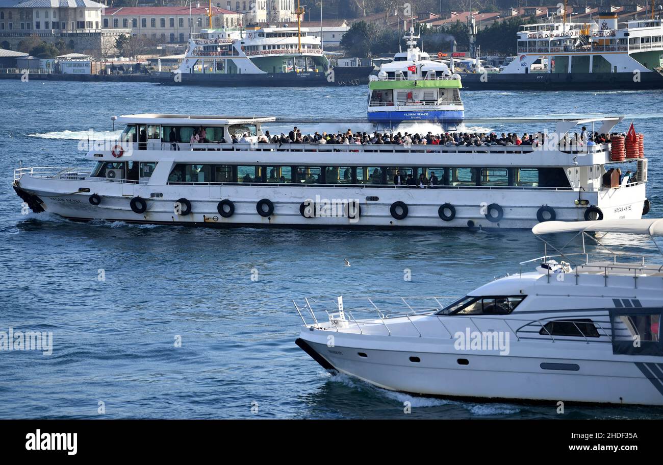 (220106) -- ISTANBUL, Jan. 6, 2022 (Xinhua) -- Tourists visit the Bosphorus Strait in Istanbul, Turkey, Jan. 5, 2022. (Xinhua/Shadati) Stock Photo
