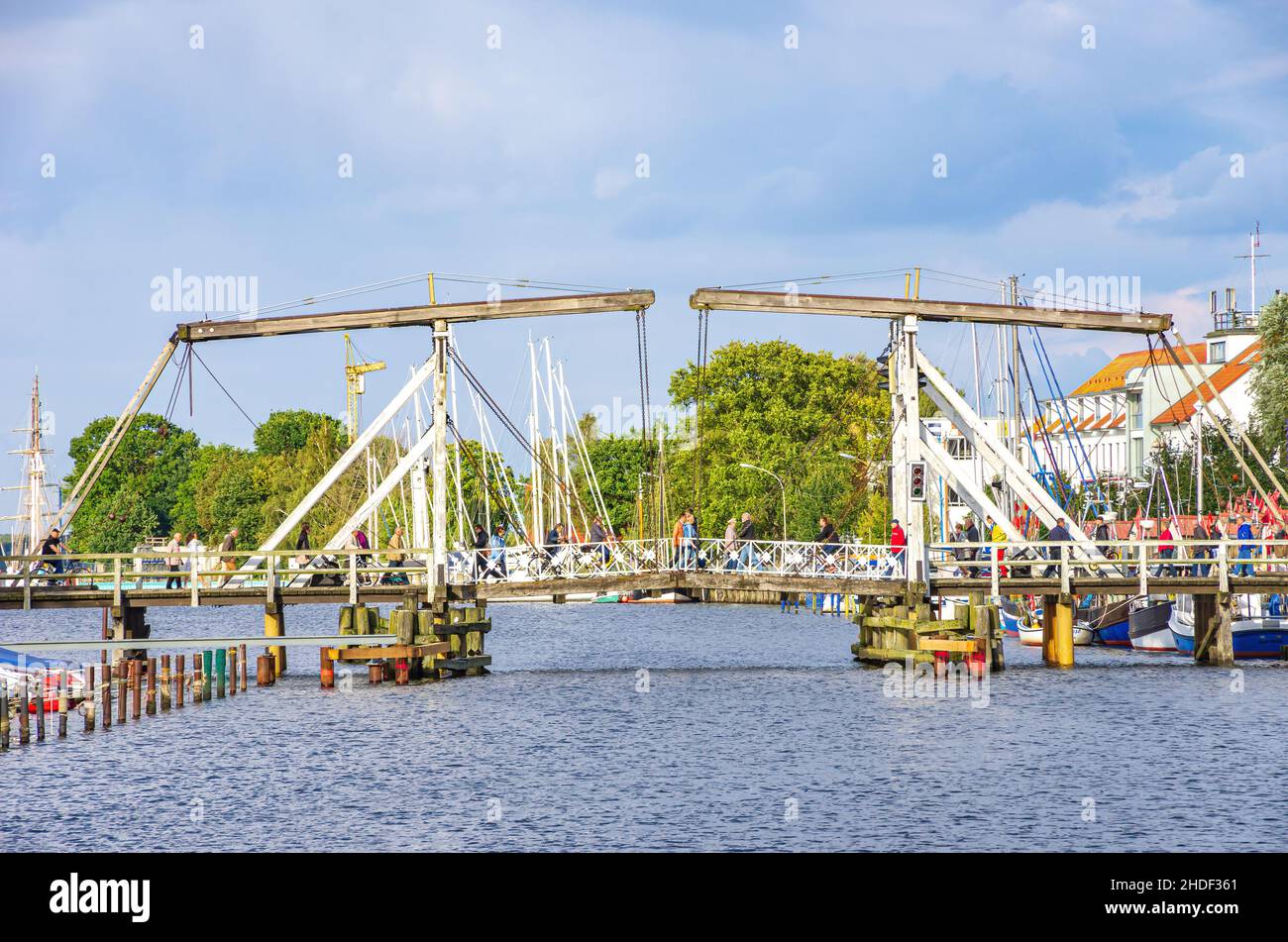 Picturesque view of the old Wieck wooden bascule bridge over the river Ryck, Greifswald-Wieck city harbour, Hanseatic City of Greifswald, Germany. Stock Photo