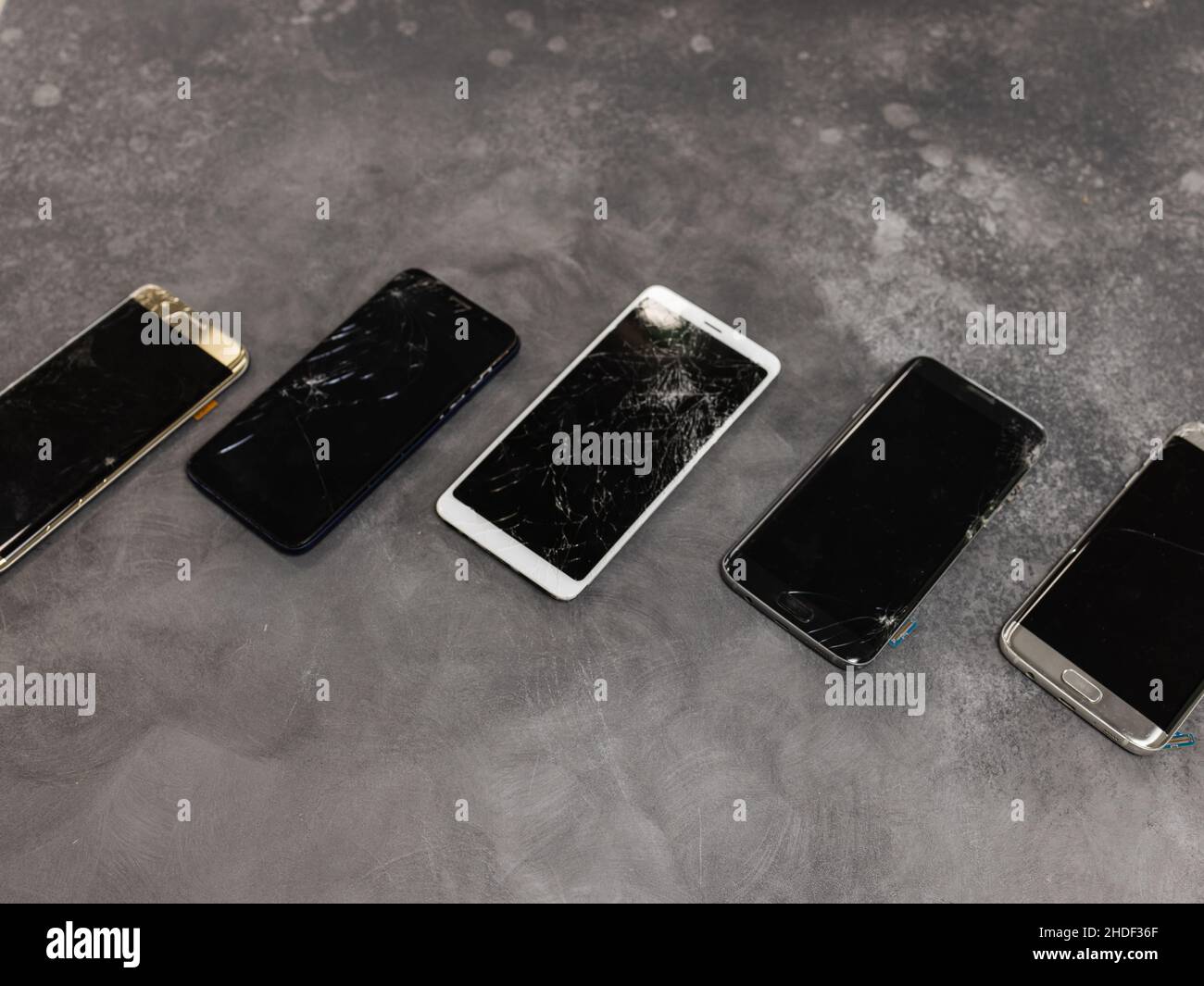 Broken mobile phone screen, black, white, clipping path. Smartphone monitor damage mock up