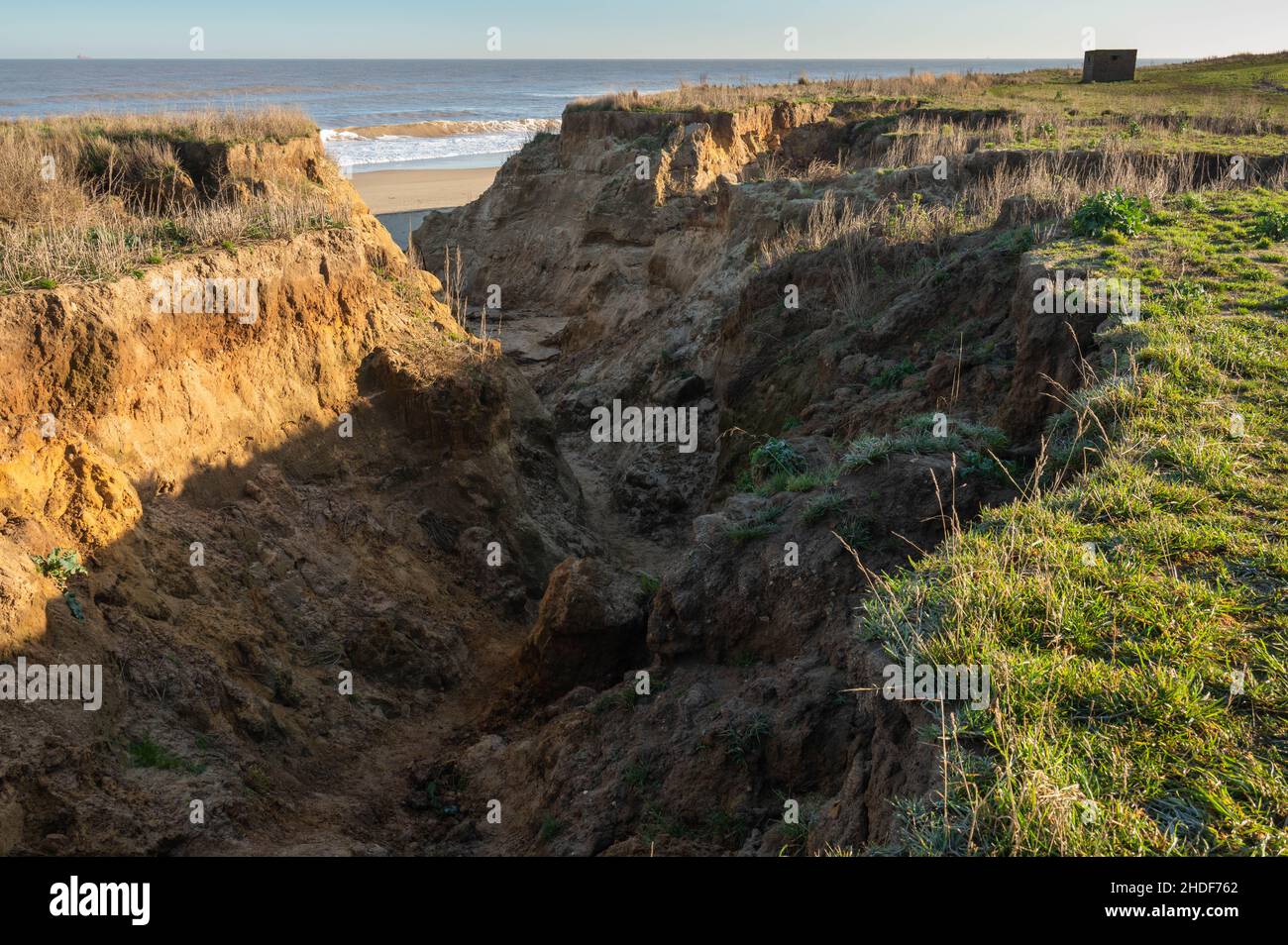 East Coast erosion at Happisburgh beach cliffs due to high spring tides