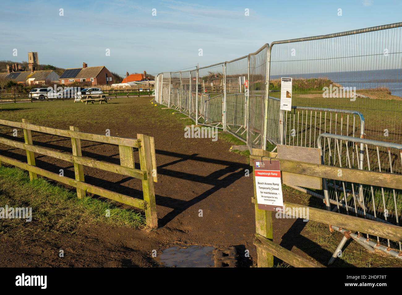 Happisburgh beach closed due to collapsed walkway with metal fencing on ...