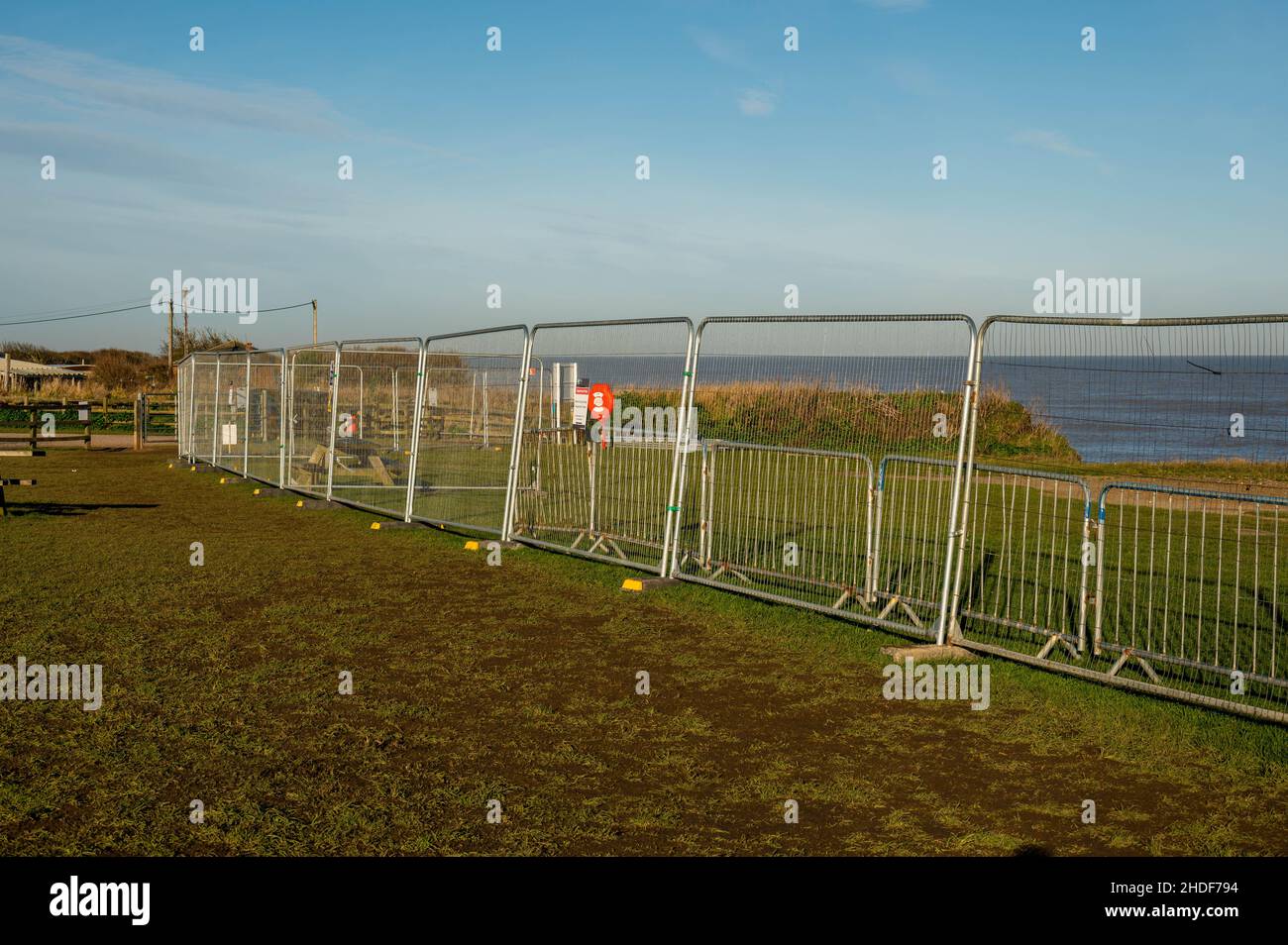 Happisburgh beach closed due to collapsed walkway with metal fencing on ...