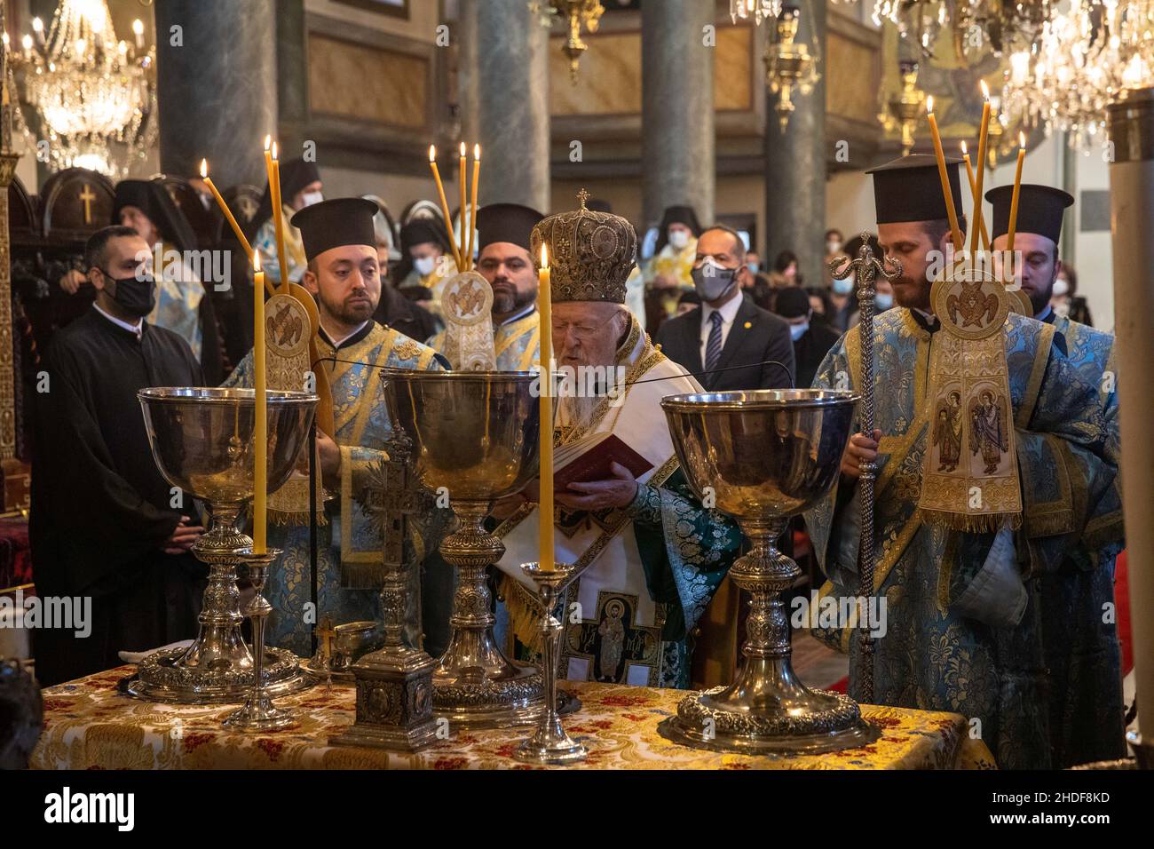 Greek Orthodox Ecumenical Patriarch Bartholomew I of Constantinople conducts the Epiphany mass as part of Epiphany day celebrations at the Church. Stock Photo