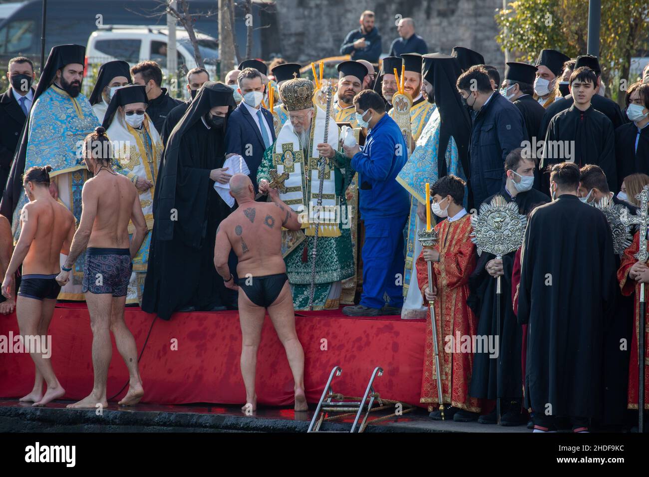 ISTANBUL, TURKEY - January 06, 2022: The swimmers are blessed when they find the cross that the Greek Orthodox Ecumenical Patriarch of Constantinople, Stock Photo