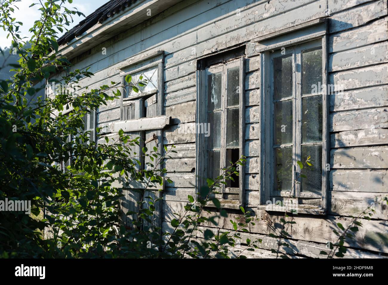 Old abandoned white wooden house Stock Photo - Alamy