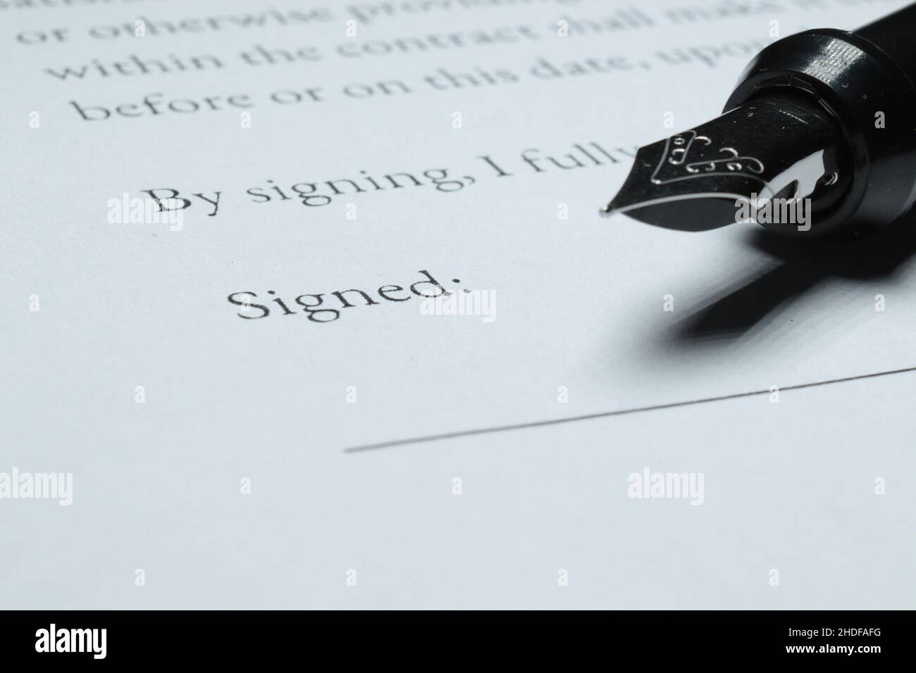 Fountain Pen placed next to signature blank Stock Photo