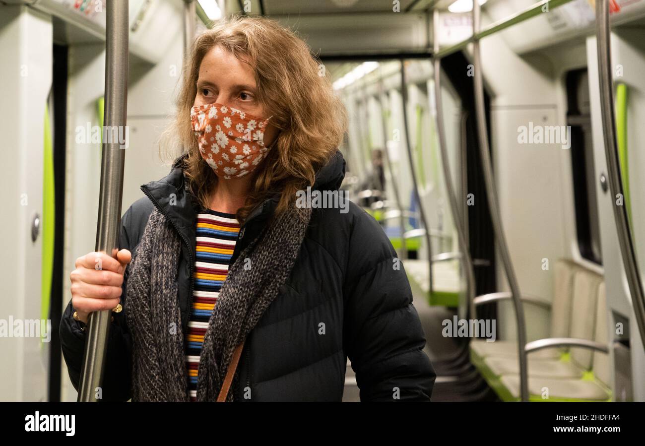 woman wearing mask in public transport Stock Photo - Alamy