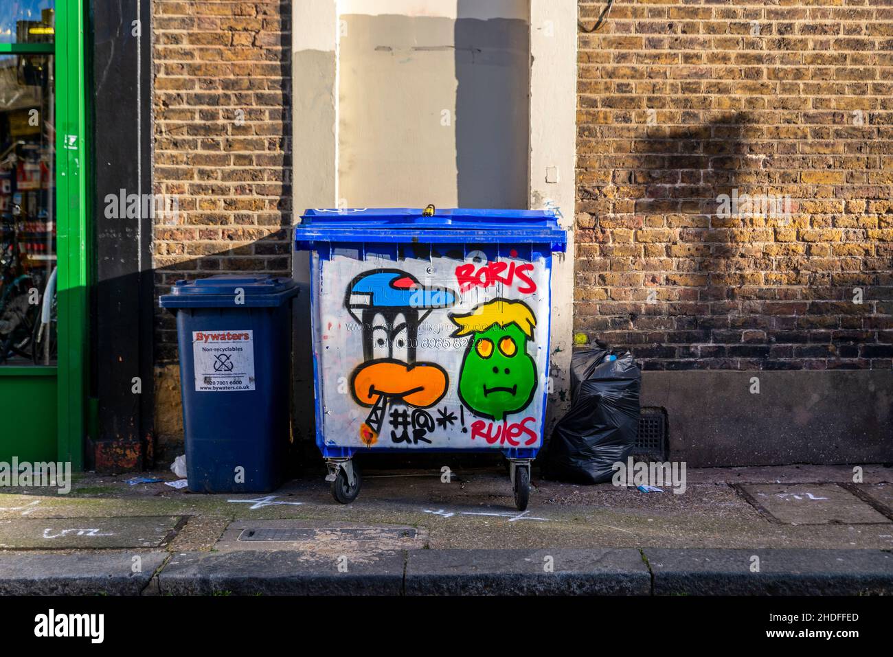 Graffiti on bins, Peckham, London Stock Photo - Alamy