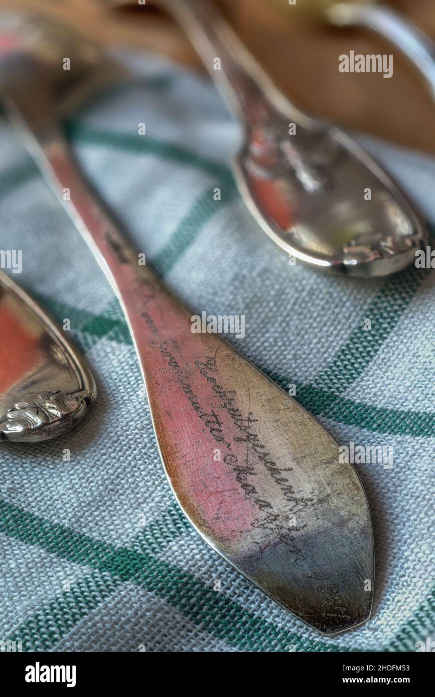 engraved image, silver cutlery, engraved images, silver cutleries Stock Photo