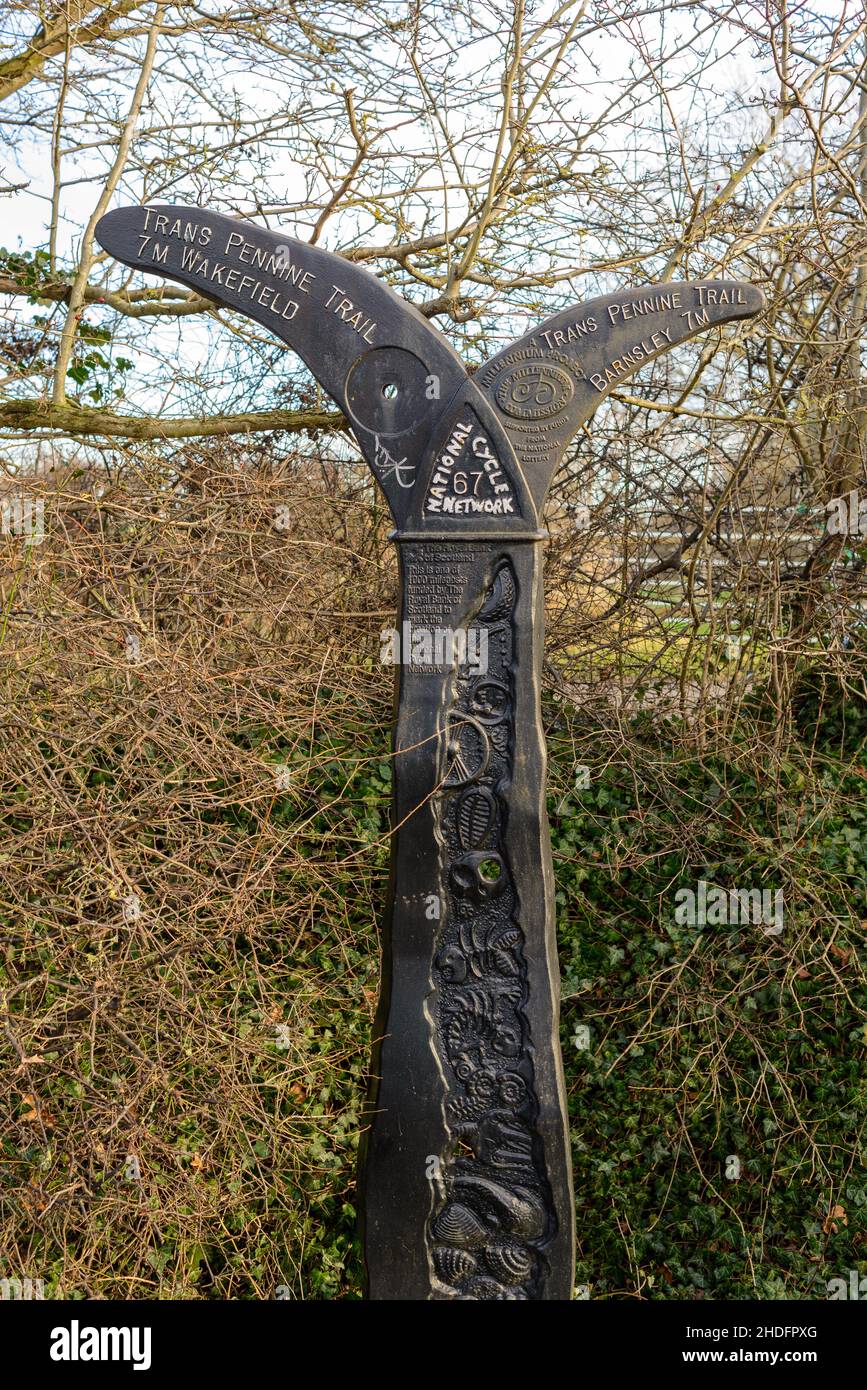 Sculptured signpost on the Trans Pennine Trail at Royston, Barnsley, South Yorkshire, UK Stock Photo