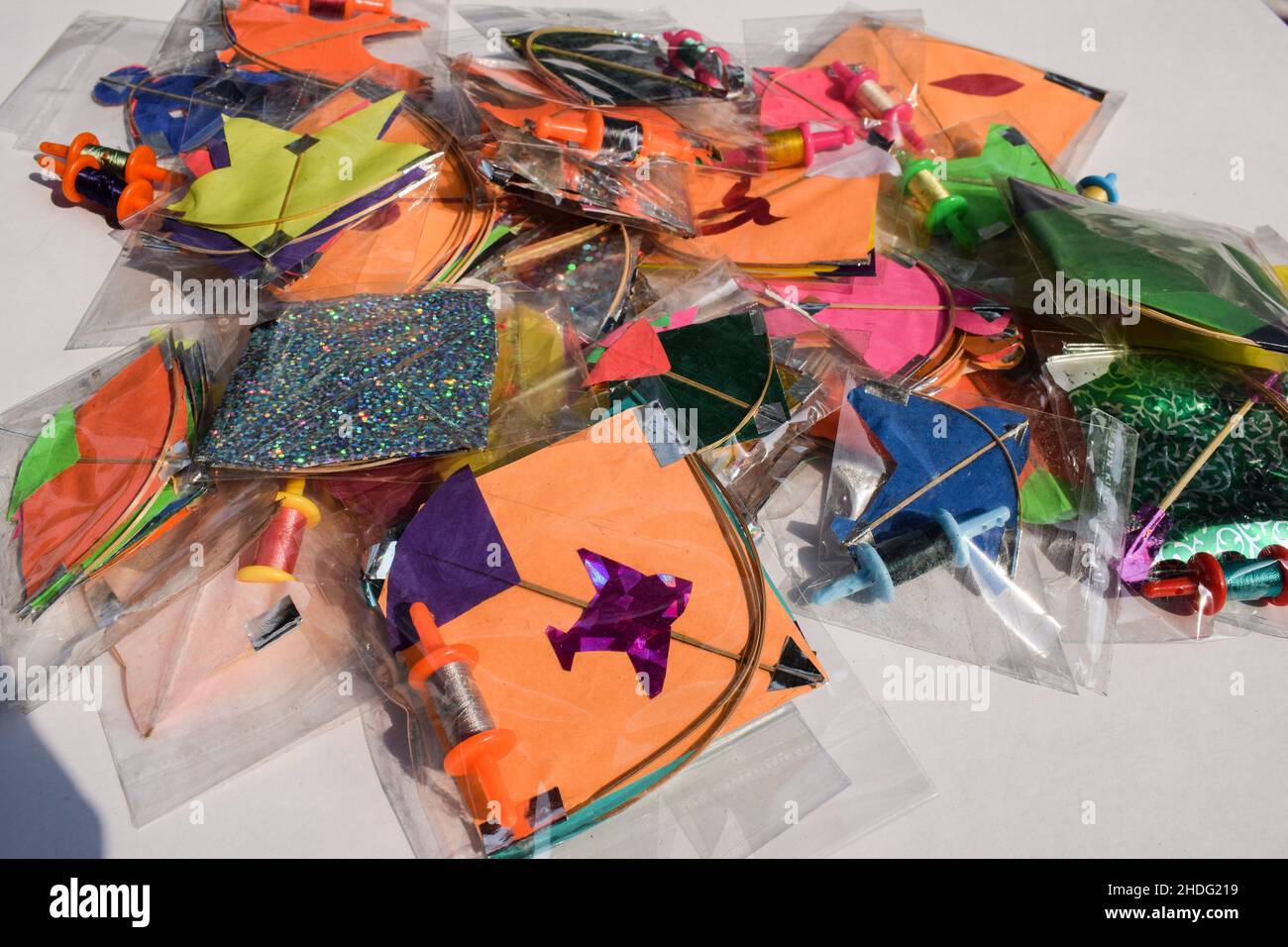 Kite shopping during Indian kite festival Makarsankranti or Uttarayan. Many kites in packets sold in India Stock Photo