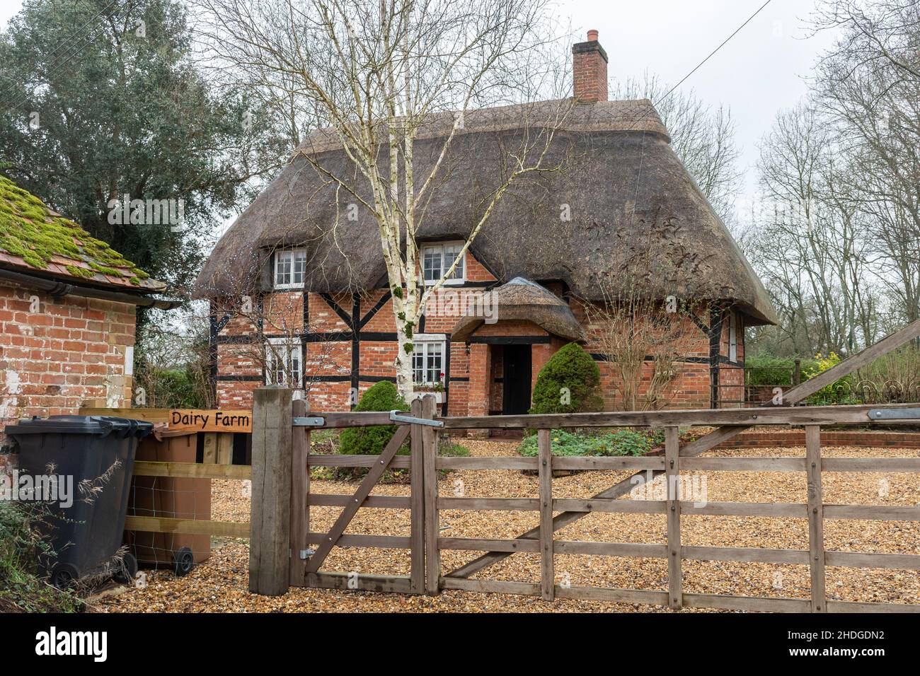 Thatched cottage called Dairy Farm in Sherfield English, a small village in the Test Valley, Hampshire, England, UK Stock Photo