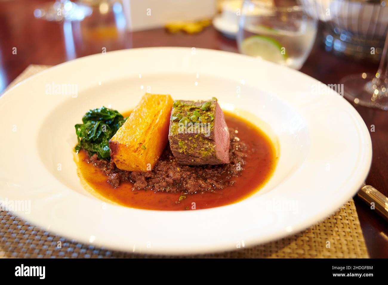 Venison Ragu crusted with roast pistachio nuts   created by Michel Roux Jr, Stock Photo
