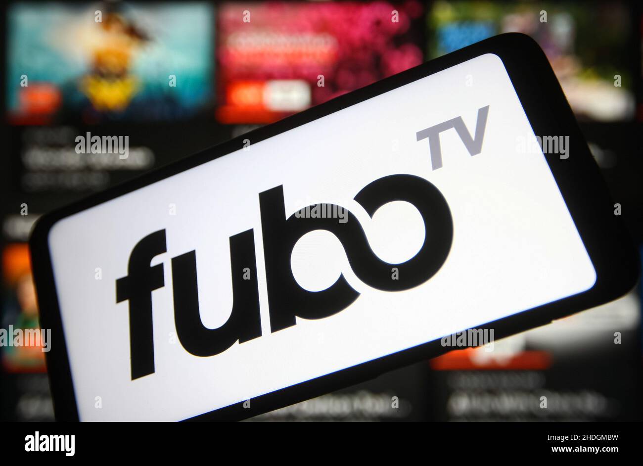 In this photo illustration, FuboTV logo seen displayed on a smartphone