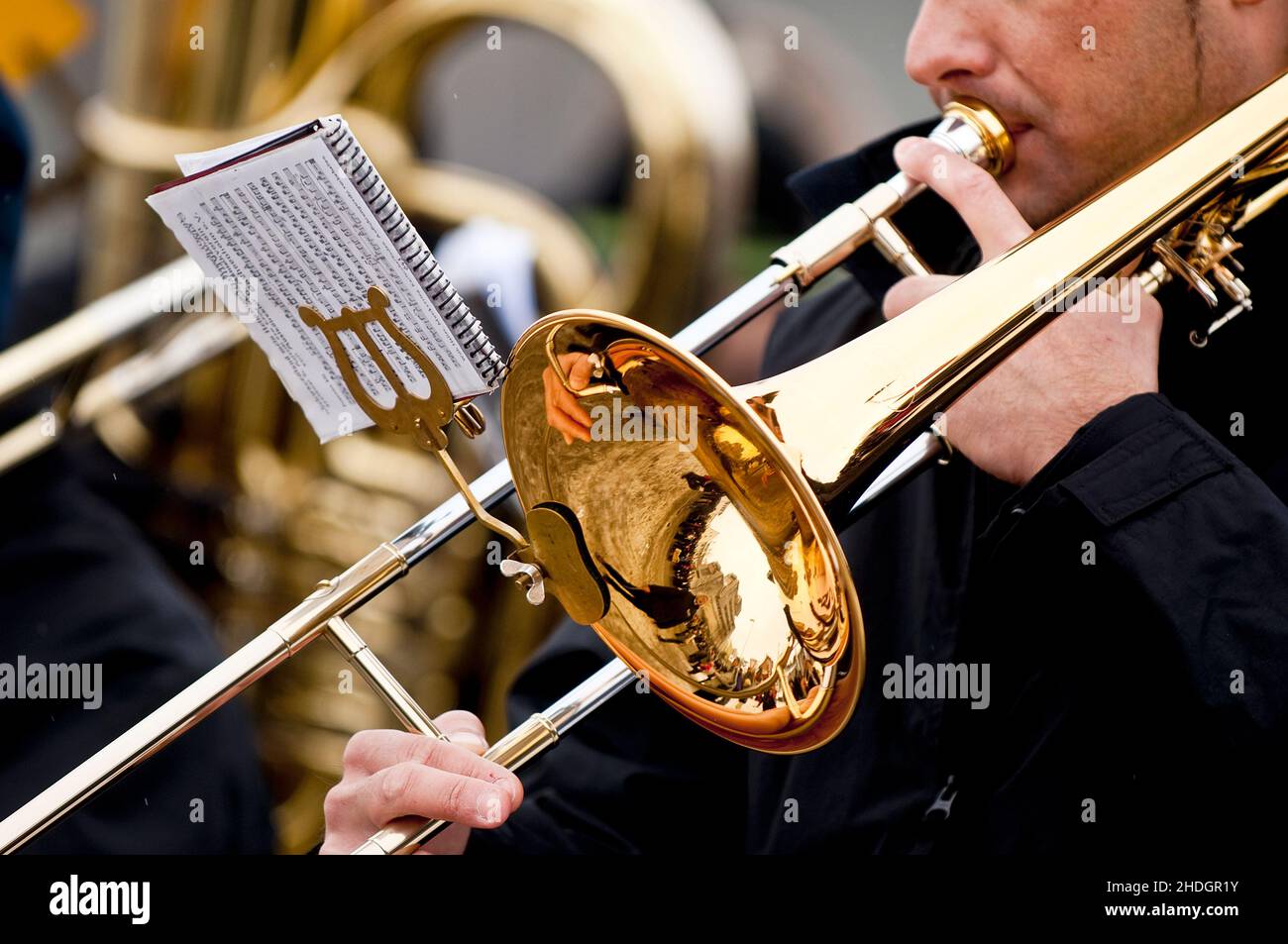 Musician holding trombone hi-res stock photography and images - Alamy