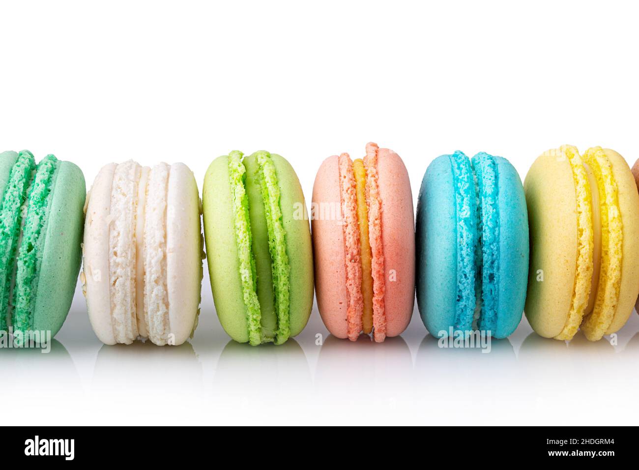 Colored macaroons isolated on white background. Clipping path Stock Photo