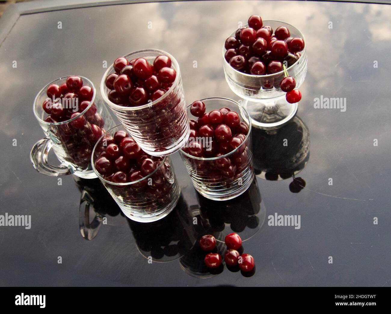 cherry compote drink on table background Stock Photo Alamy