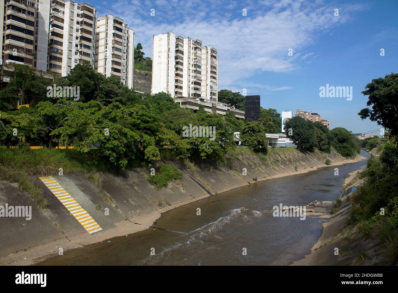 Traveling through the city canals of the Guaire river, its waters are waste and accumulate all the wastes of the industry and the Caracas population Stock Photo