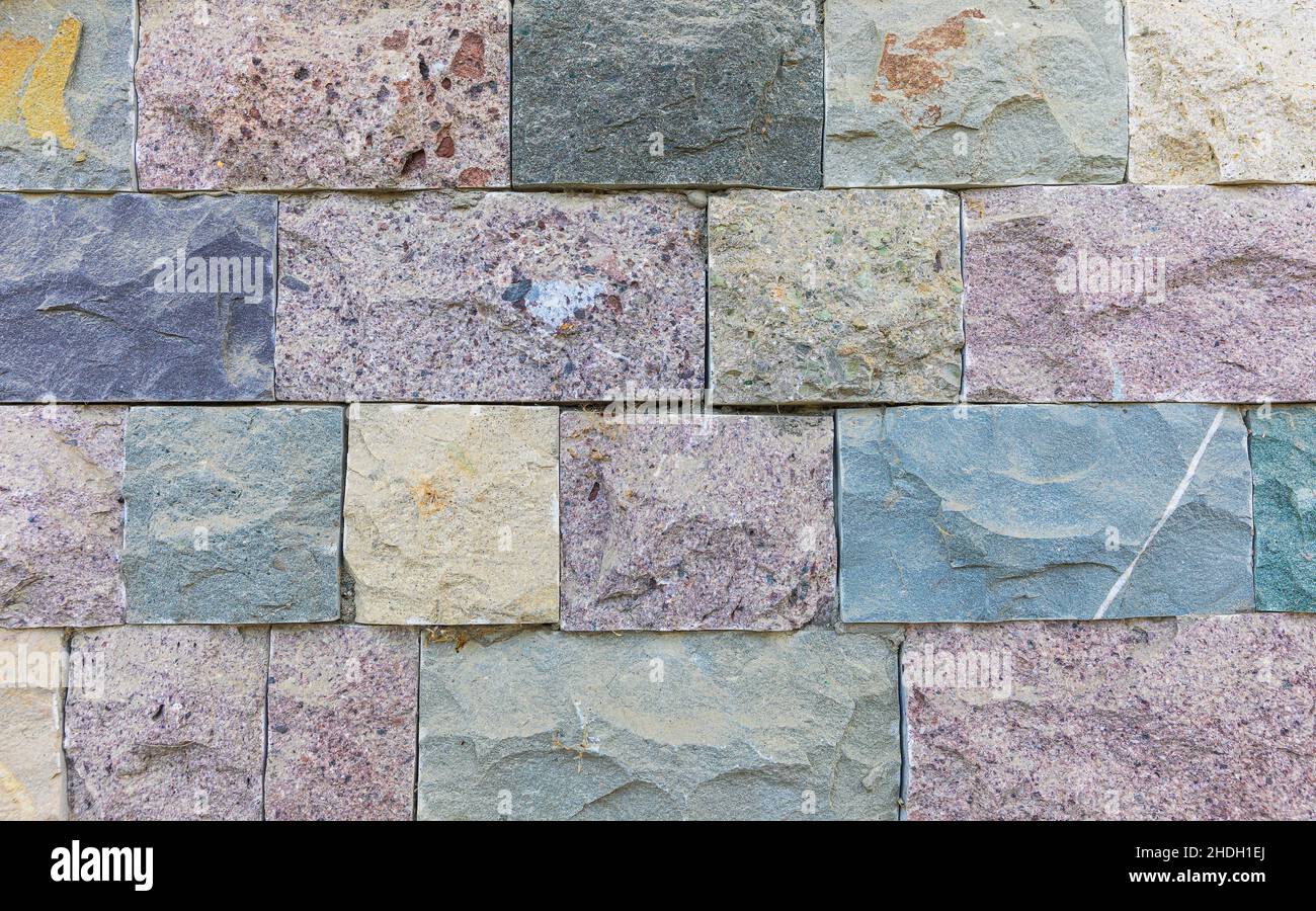 House wall made of processed river stone Stock Photo Alamy