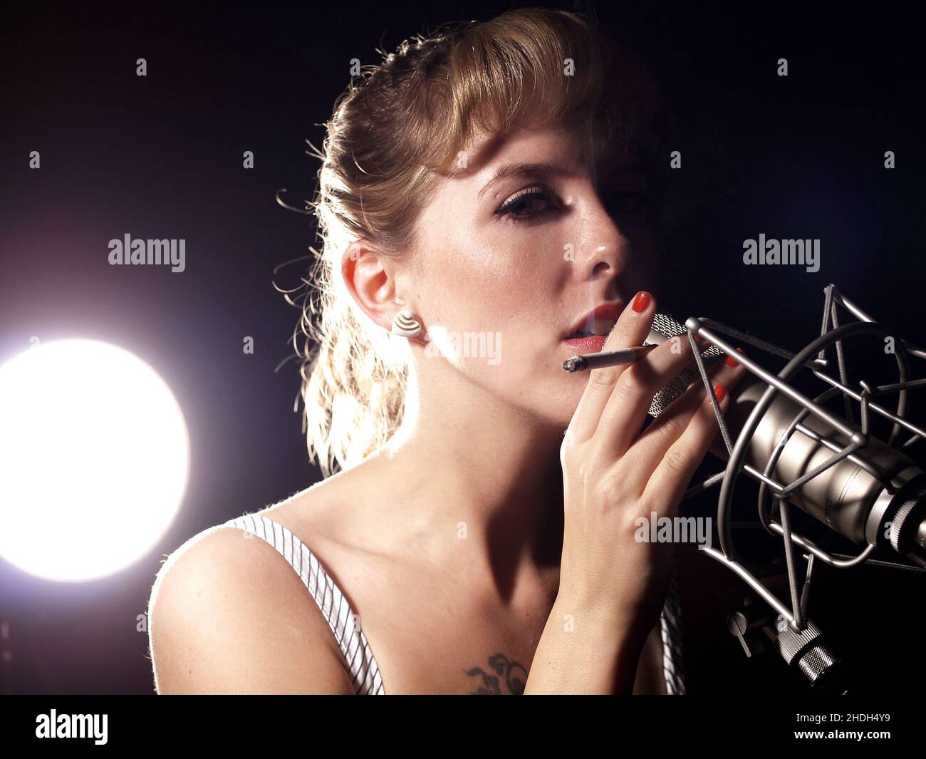 singer, microphone, singing, spotlight, singers, microphones, searchlight, searchlights, spotlights Stock Photo