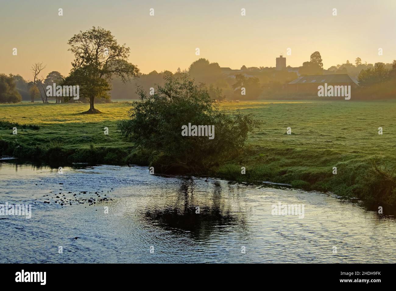UK, Devon, Axminster, River Axe and St Marys Church from A35 Bridge Stock Photo