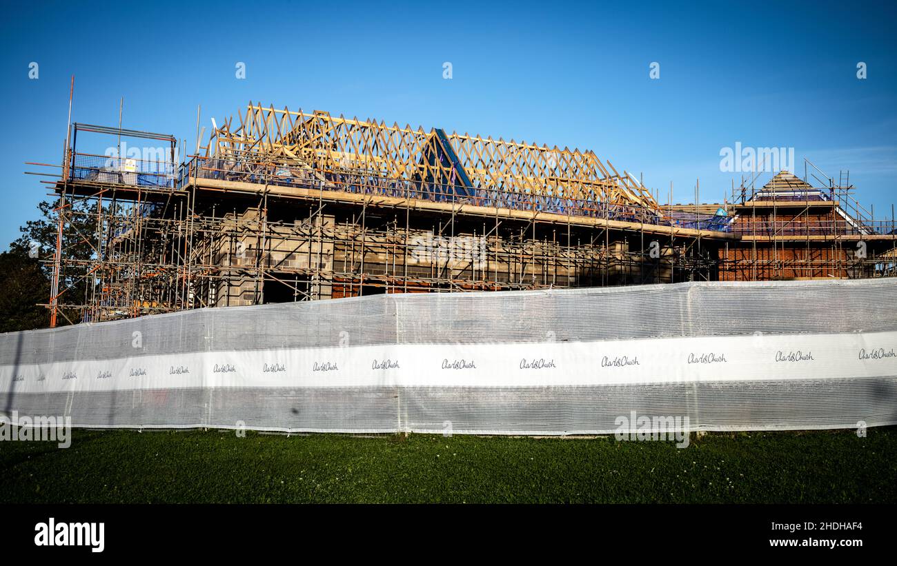 New homes built on green fields in Billingshurst, West Sussex, UK by house builder Charles Church. Stock Photo