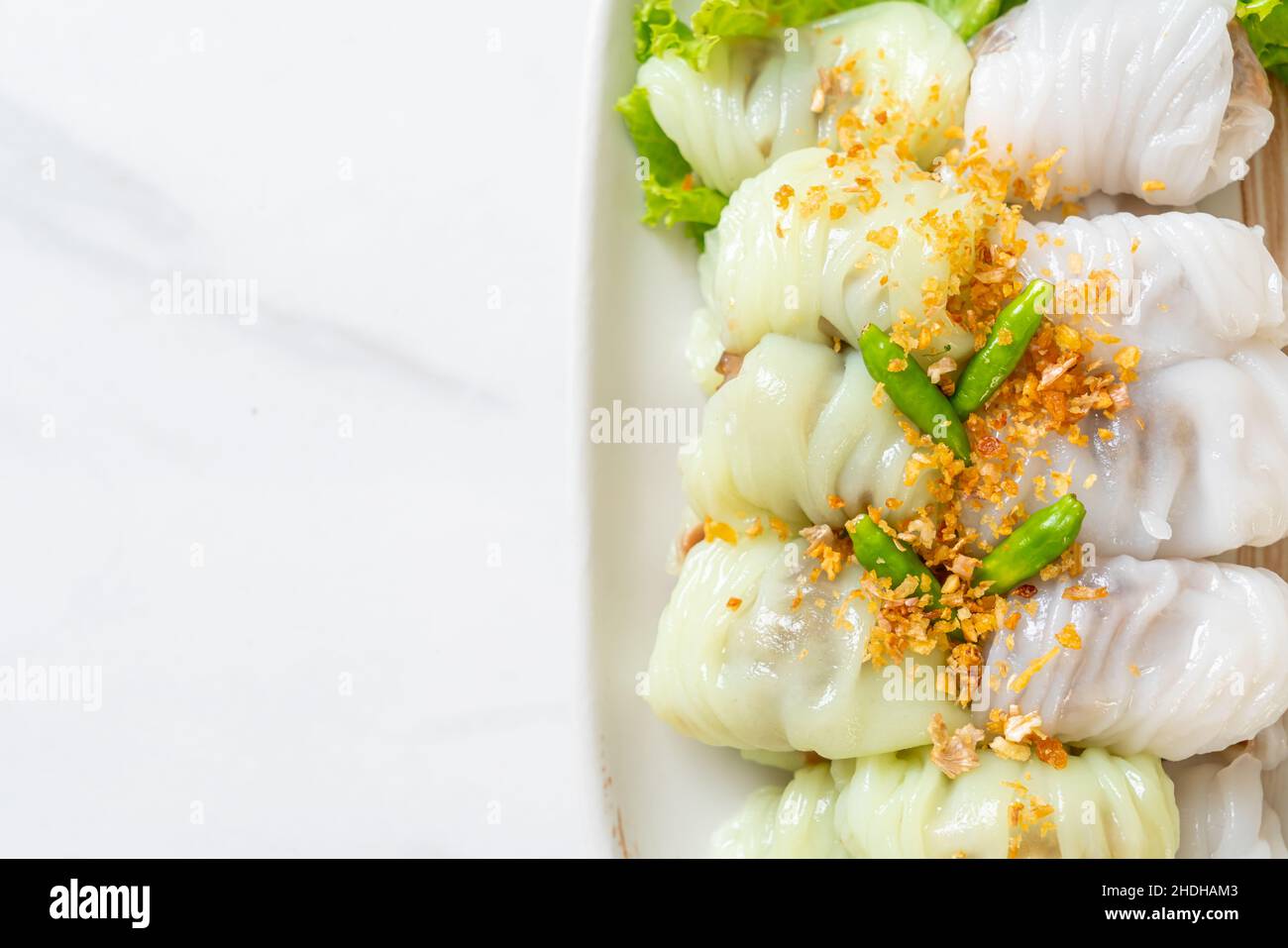 ( Kow Griep Pag Mor)Pork Steamed Rice Parcels or  Steamed Rice-Skin Dumplings Stock Photo