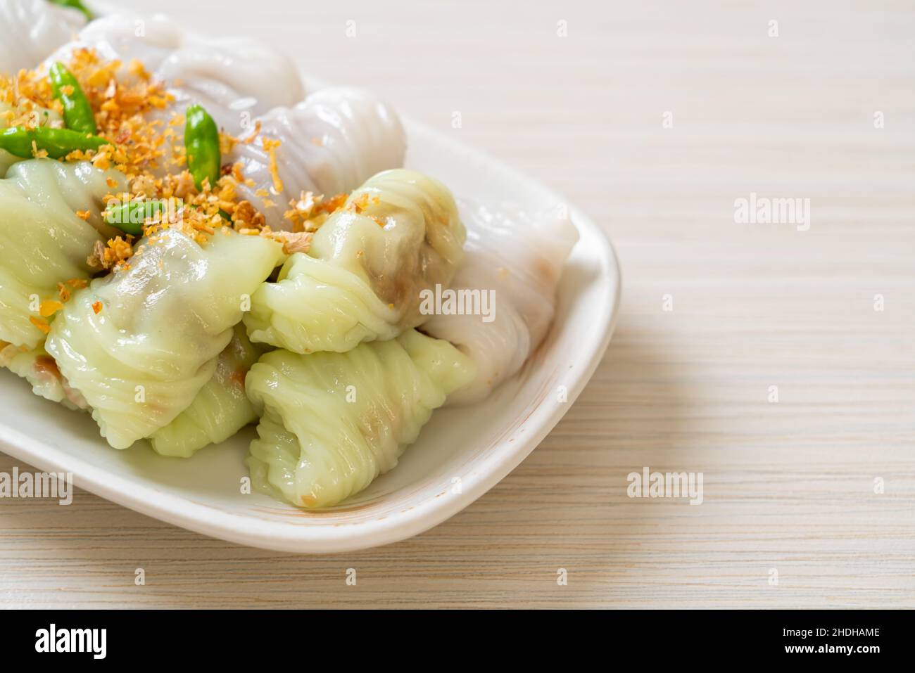 ( Kow Griep Pag Mor)Pork Steamed Rice Parcels or  Steamed Rice-Skin Dumplings Stock Photo