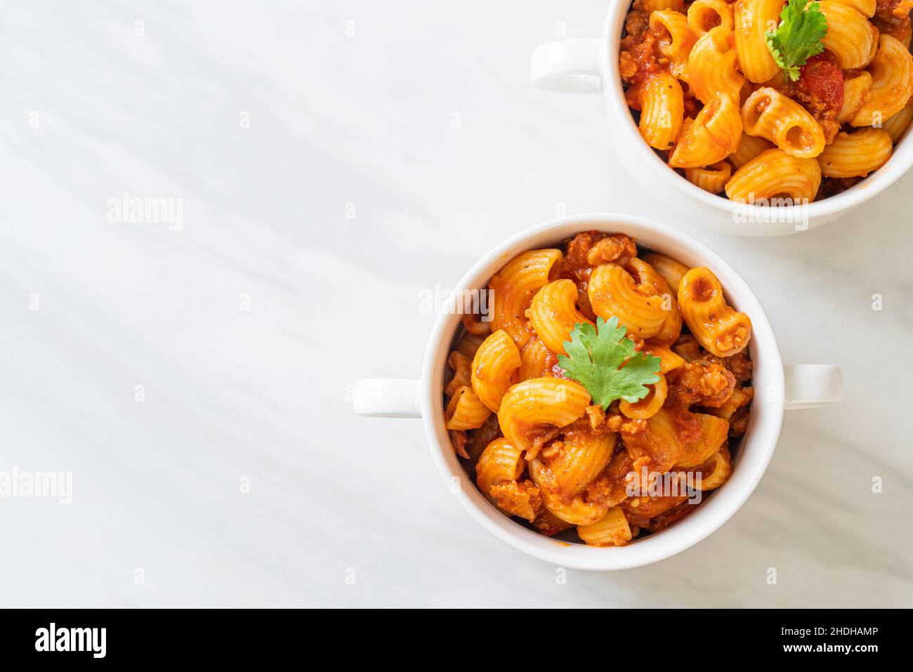 macaroni with tomatoes sauce and mince pork, american chop suey, american goulash Stock Photo