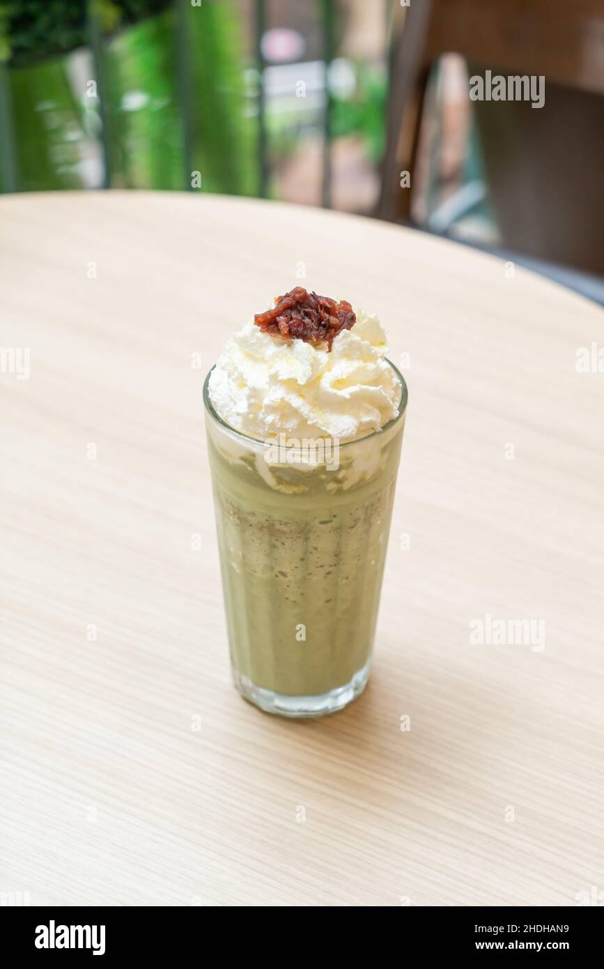 matcha green tea latte blended with whipped cream and red bean in