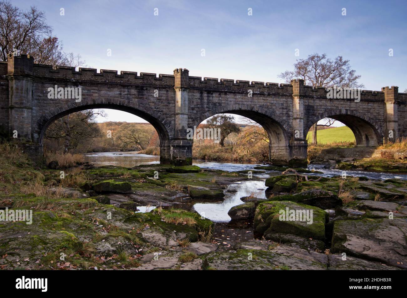 Barden Tower, spanning the River Wharfe, in the grounds of Bolton Abbey, Barden, Skipton, UK Stock Photo