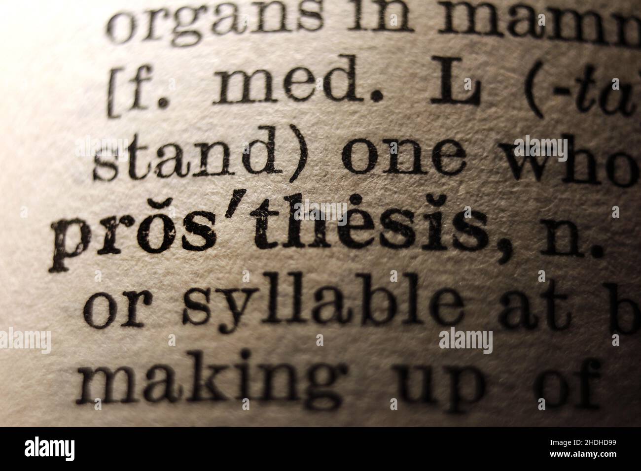Word 'prosthesis' printed on dictionary page, macro close-up Stock Photo