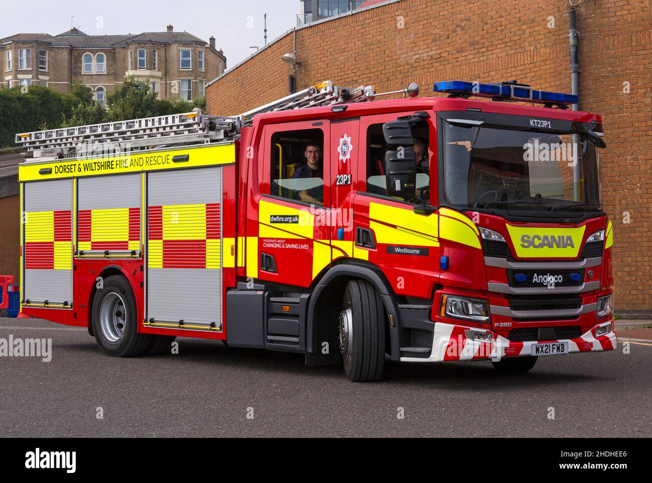 Dorset & Wiltshire Fire and Rescue fire engine parked outside