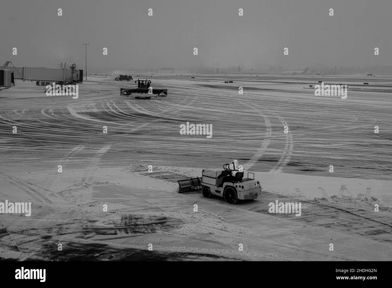 Activities at Airport with Heavy Snowfall Stock Photo