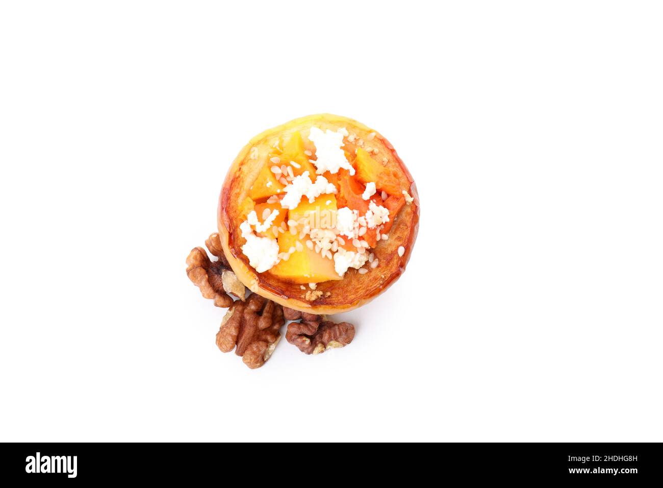 Stuffed baked apple isolated on white background Stock Photo