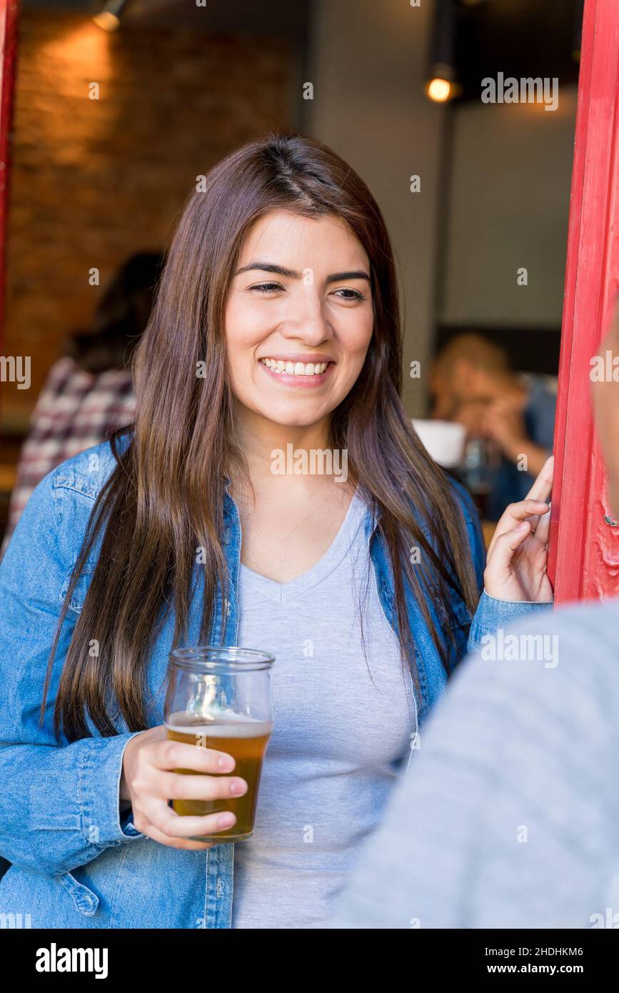 Woman bar counter sociability hi-res stock photography and images - Alamy