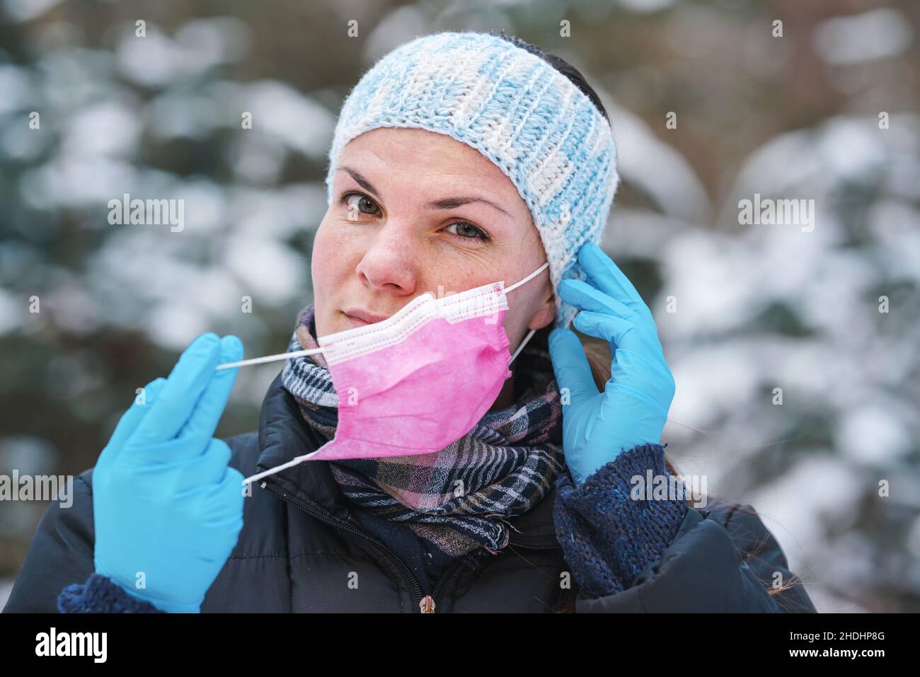 Woman removing her clothes hi-res stock photography and images - Alamy
