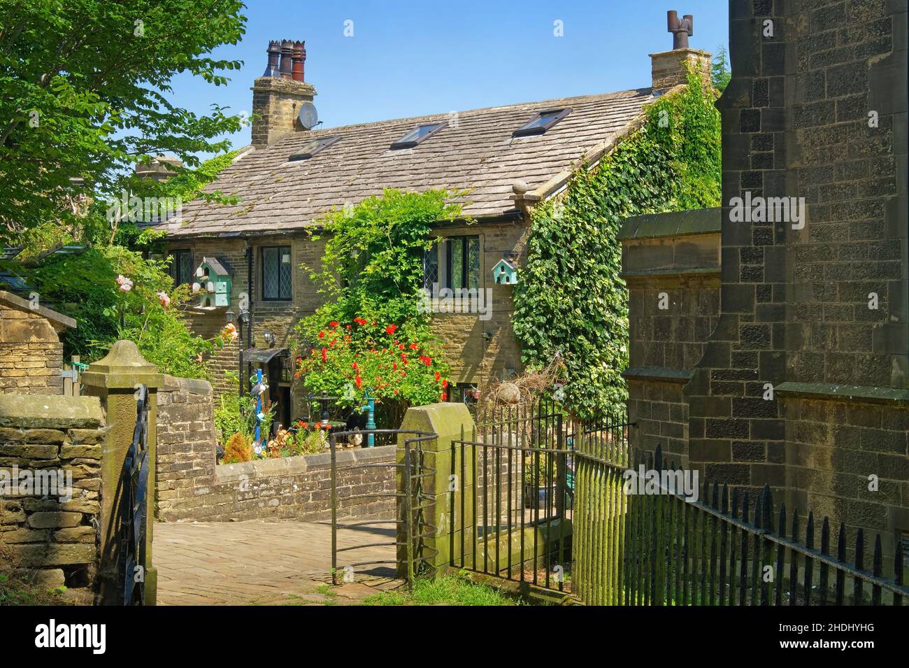 UK, West Yorkshire, Haworth, Church Street, The Rookery Nook and Bronte Parsonage from the Church Entrance Stock Photo