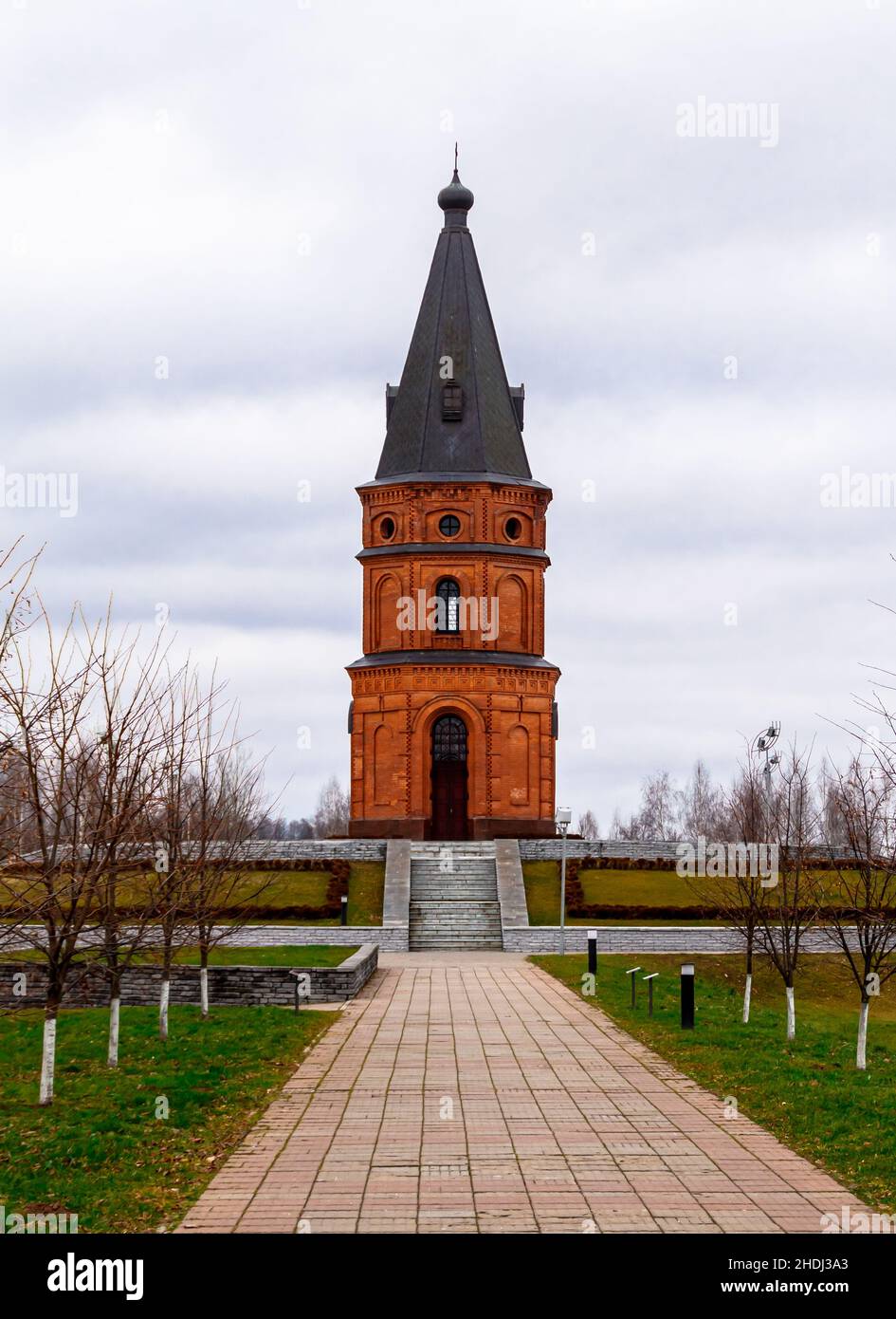 Buynichskoe field WWII memorial. Mogilev, Belarus - 28 November 2021: Brick red church. Stock Photo