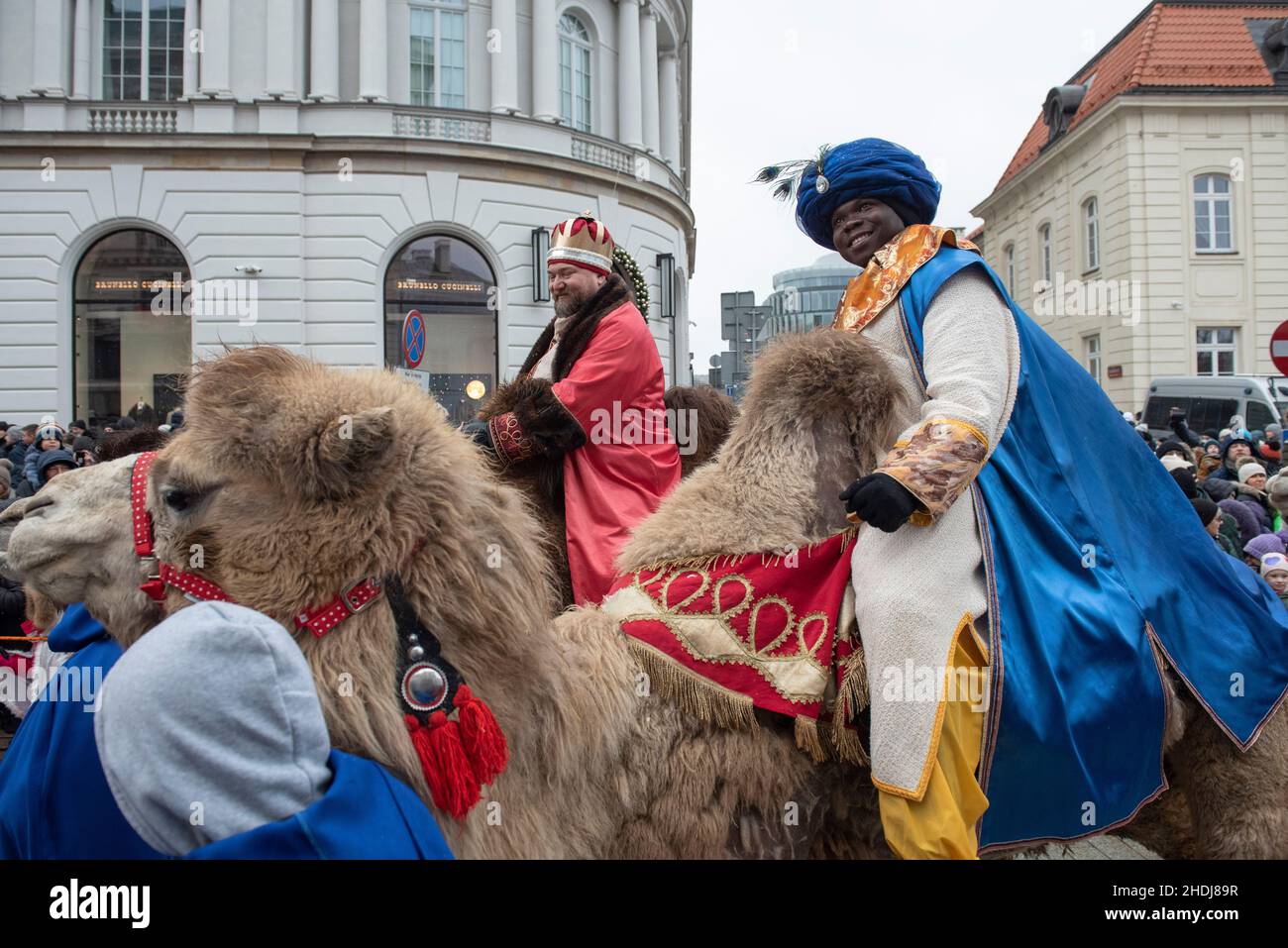 Warsaw, Warsaw, Poland. 6th Jan, 2022. Men dressed as kings are seen on camelback during the Epiphany celebration on January 6, 2022 in Warsaw, Poland. Several hundreds of people gathered in the old town to celebrate Epiphany, also known as Three Kings Day in Poland, despite the rising number of Sars-CoV2 (Coronavirus) infections. (Credit Image: © Aleksander Kalka/ZUMA Press Wire) Stock Photo