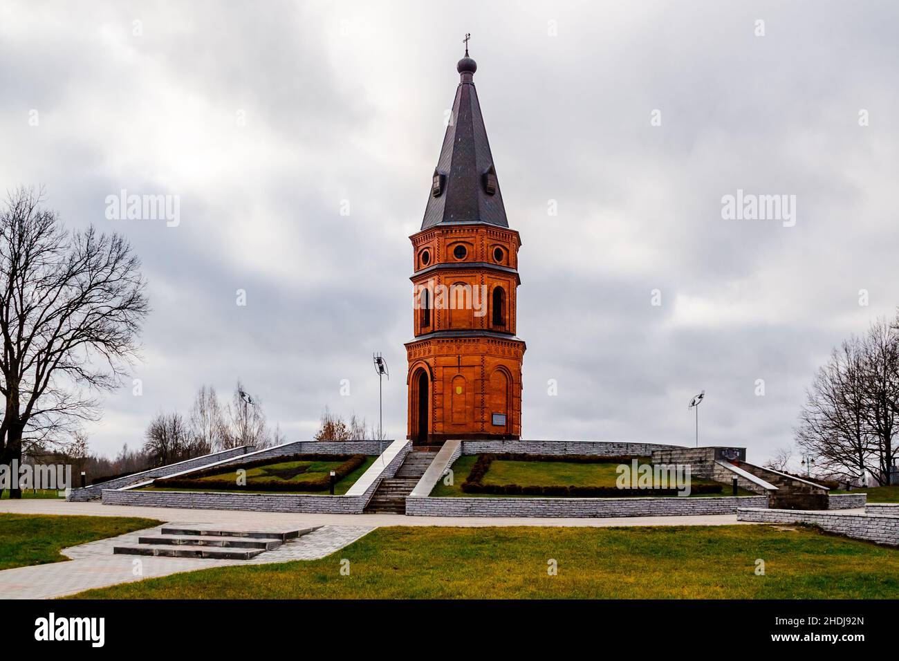 Buynichskoe field WWII memorial. Mogilev, Belarus - 28 November 2021: Brick red church. Stock Photo