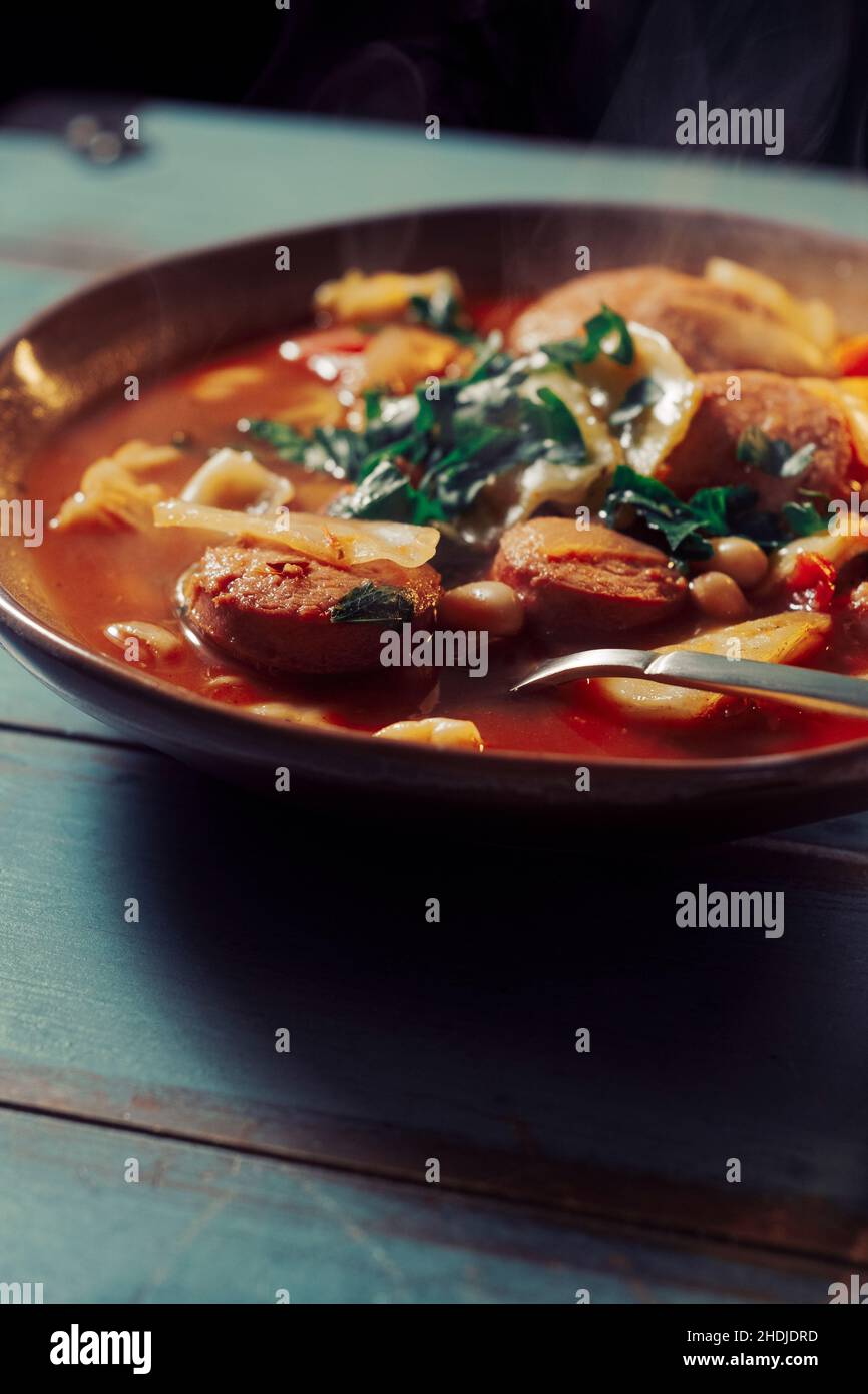 Traditional Polish cabbage kielbasa sausage and bean soup Stock Photo