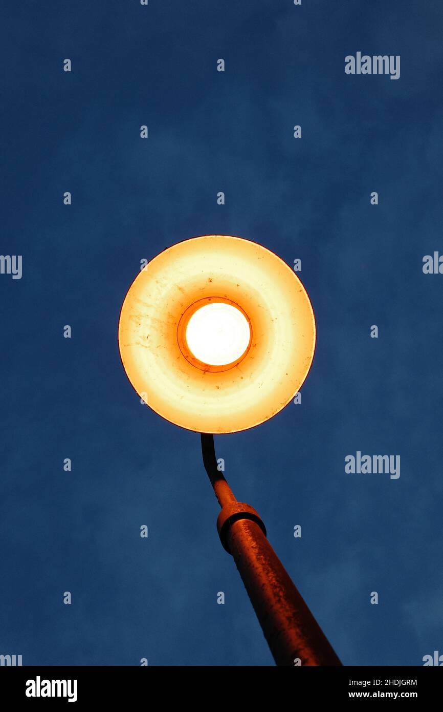 Low angle shot of a street light on the night sky background Stock