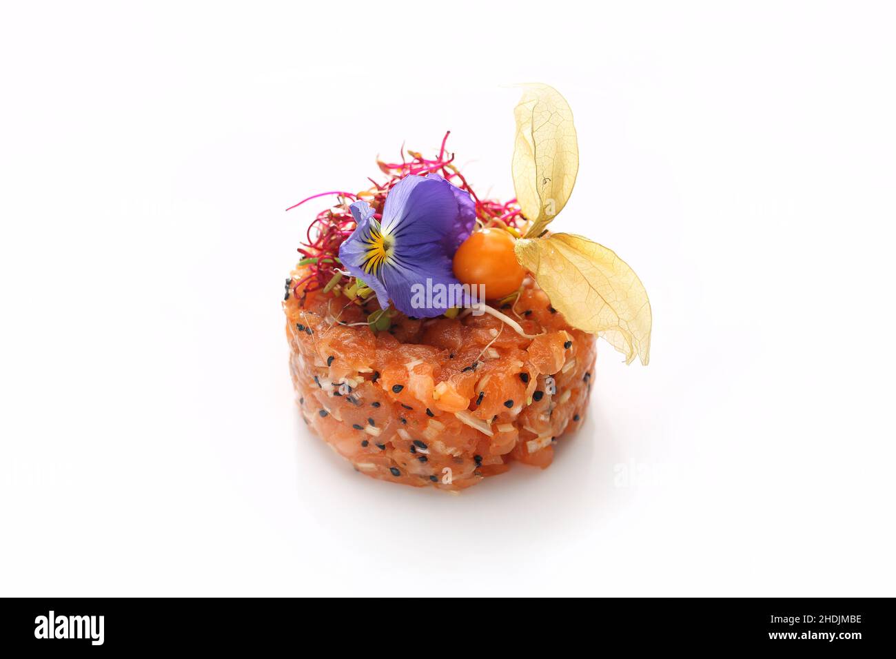 Salmon tartare. Chopped salad with fresh fish and vegetables