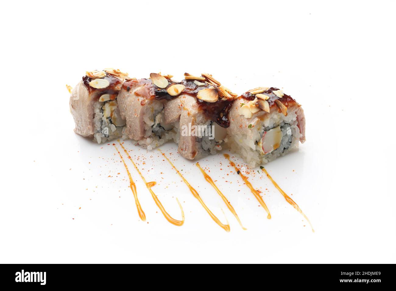 Sushi with salmon in tempura Traditional sushi rolls on a white background. Stock Photo