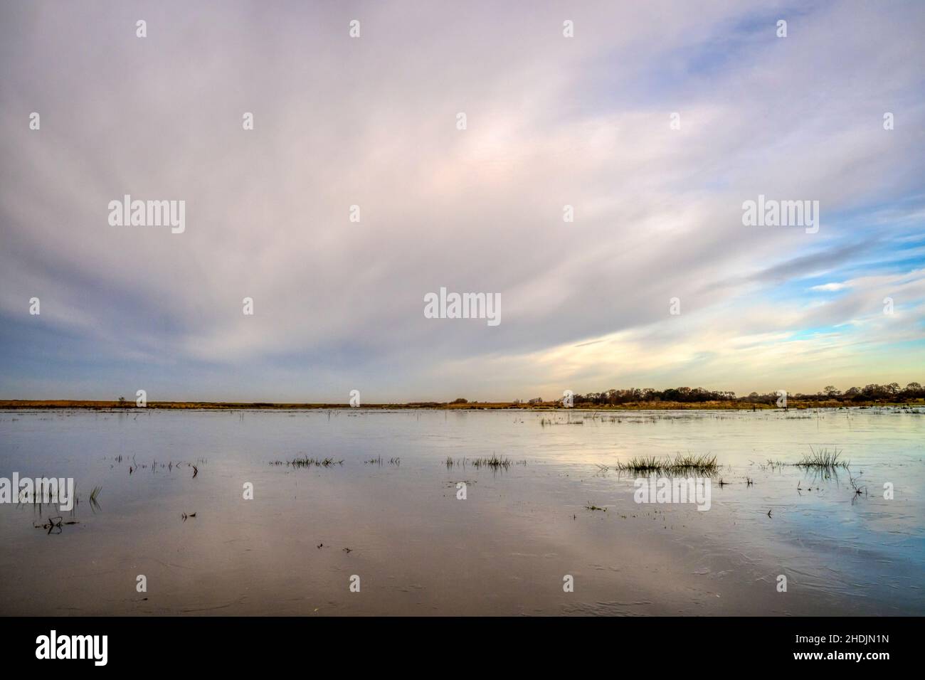 Flooded freshwater marshes on the Ken Hill estate in Norfolk during winter. Stock Photo