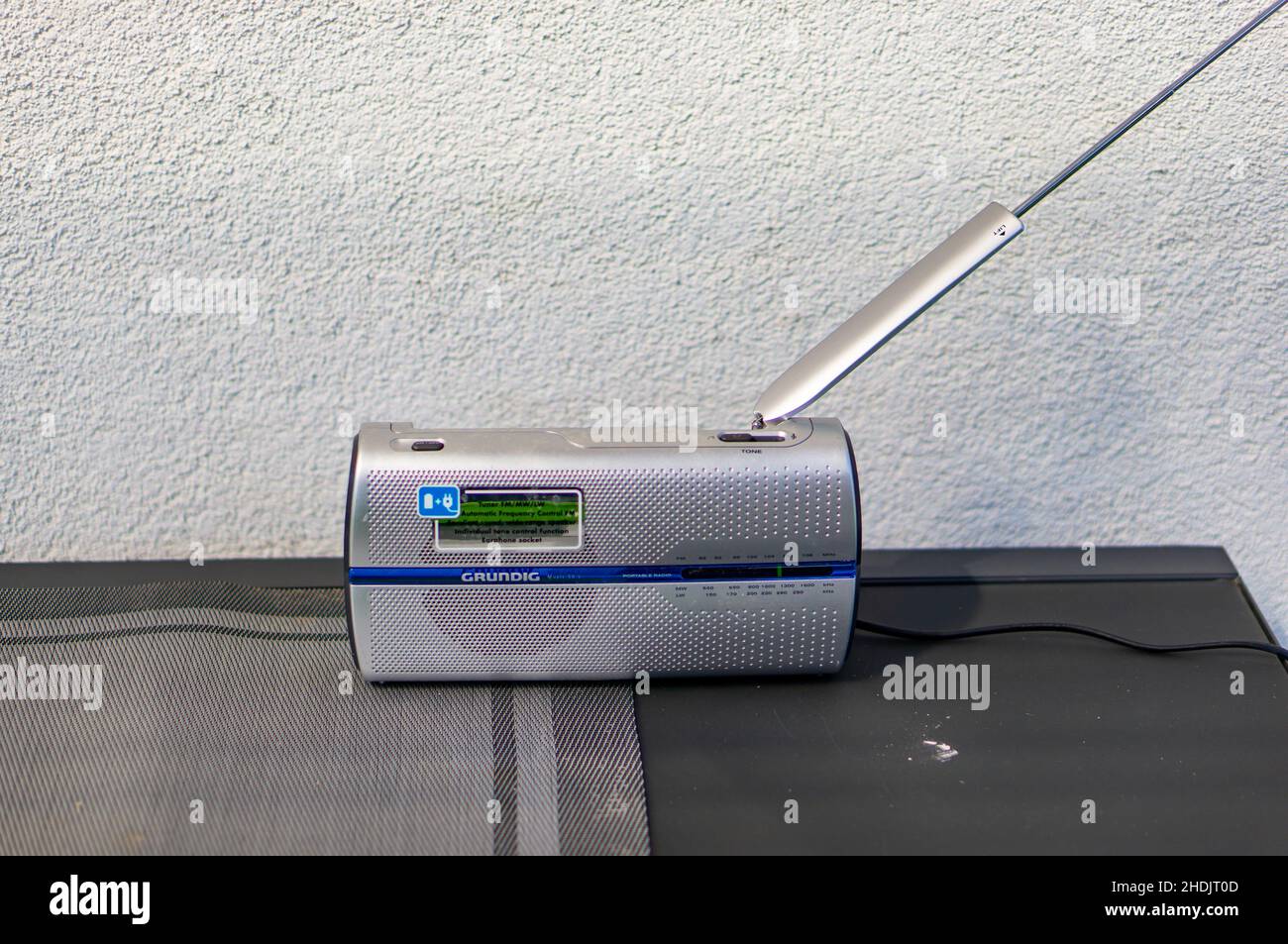 Grundig brand radio with an antenna on a table Stock Photo