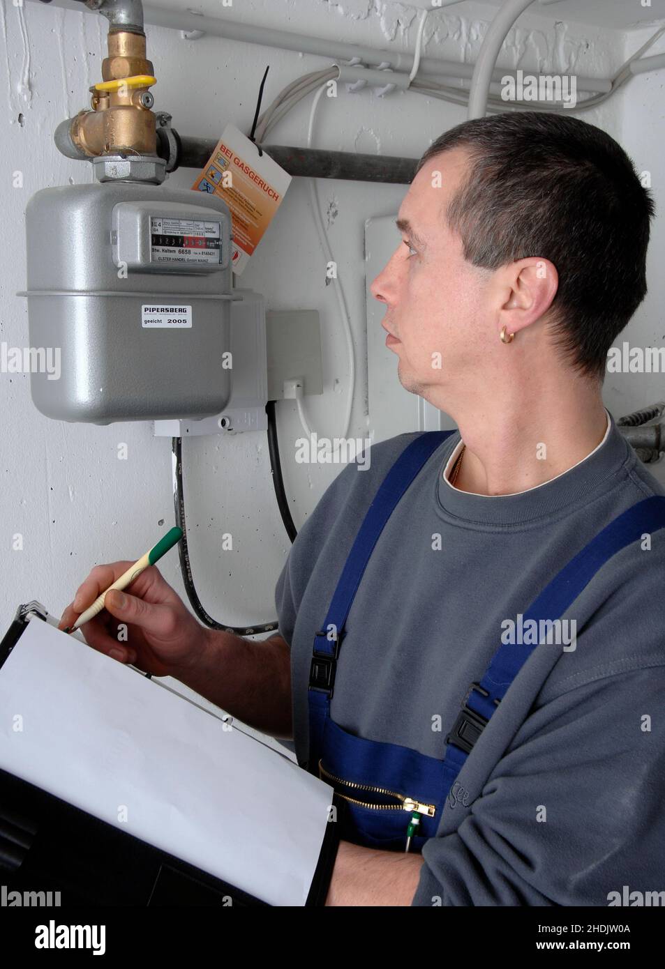 craftsman, gas meter, reading, craftsmen, gas meters, read, reading a book, reading something, to read Stock Photo